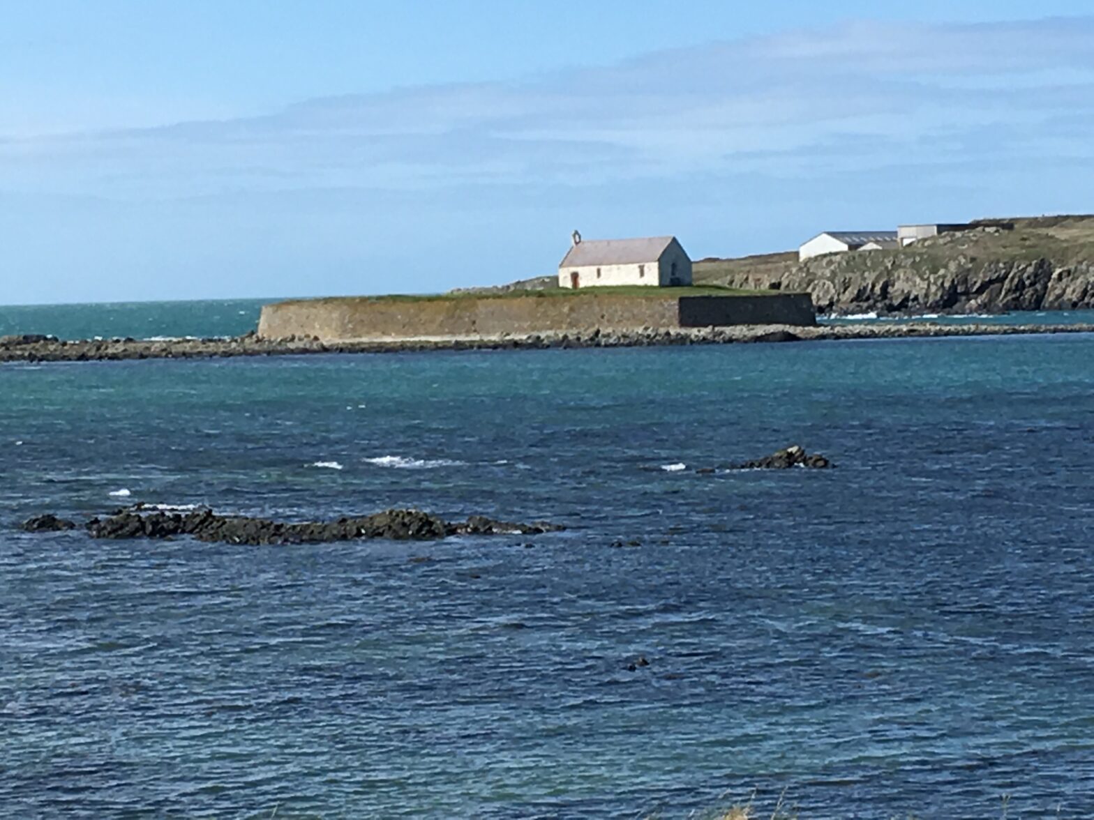 St Cwyfan's, the 'church in the sea' is marooned at high tide, off Anglesey.
