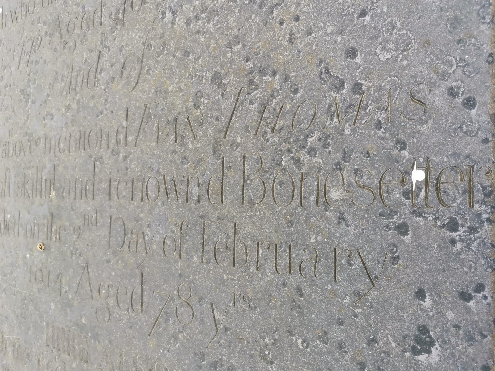 A grave stone showing the word bonesetter from Anglesey